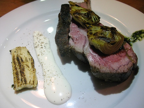 Rack of lamb, fresh goat cheese, smoked eel, artichokes, potato mousseline and mint