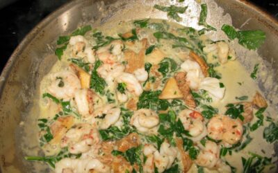 Shrimp, chanterelles, spinach, butter and cream over pasta
